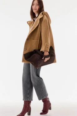 Abrigo de doble faz con capucha