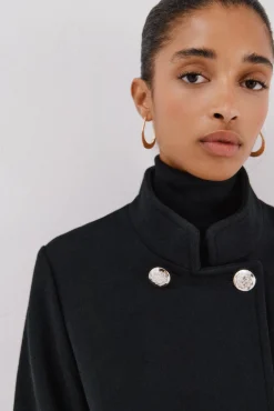 Abrigo doble cruce botón dorado