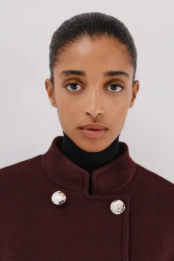 Abrigo doble cruce botón dorado