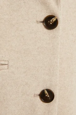 Abrigo largo bolsillos