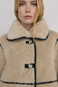 Abrigo reversible de efecto pelo