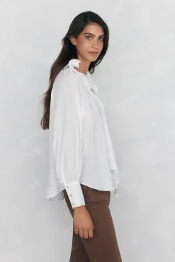 Blusa amplia lisa