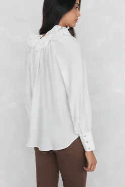Blusa amplia lisa