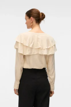 Blusa cuello de volantes