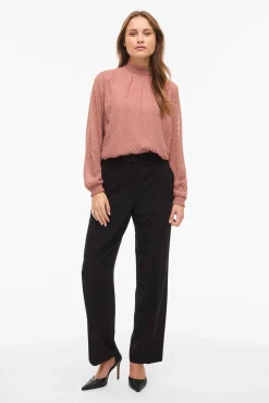 Blusa de manga larga con cuello alto