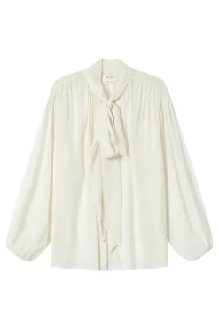 Blusa fluida con lazada