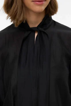 Blusa mujer de manga larga con lazo en el cuello