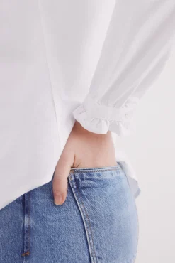 Blusa Oxford cuello volante