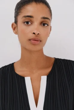 Blusa plisada contraste