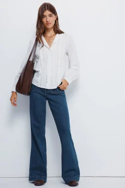 Blusa romántica schiffly