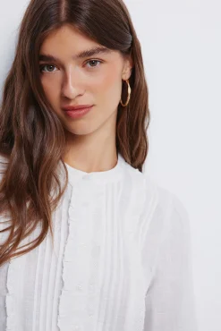 Blusa romántica schiffly