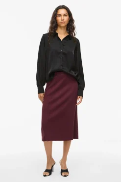 Blusa satinada de manga larga