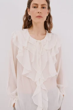 Blusa volante delantero