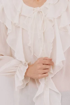 Blusa volante delantero