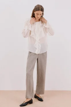 Blusa volante delantero