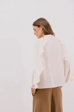 Blusa volante delantero