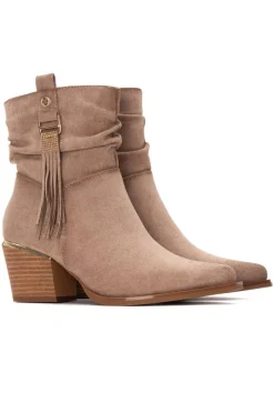 Botín cowboy flecos