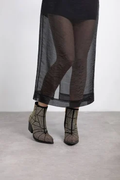 Botín cowboy tachas