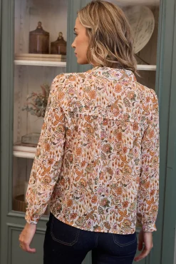 Camisa floral con cuello pico