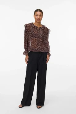 Camisa manga larga volantes