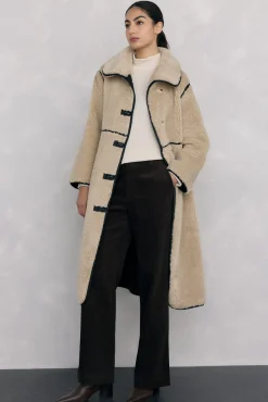 Camiseta cuello alto arrugada