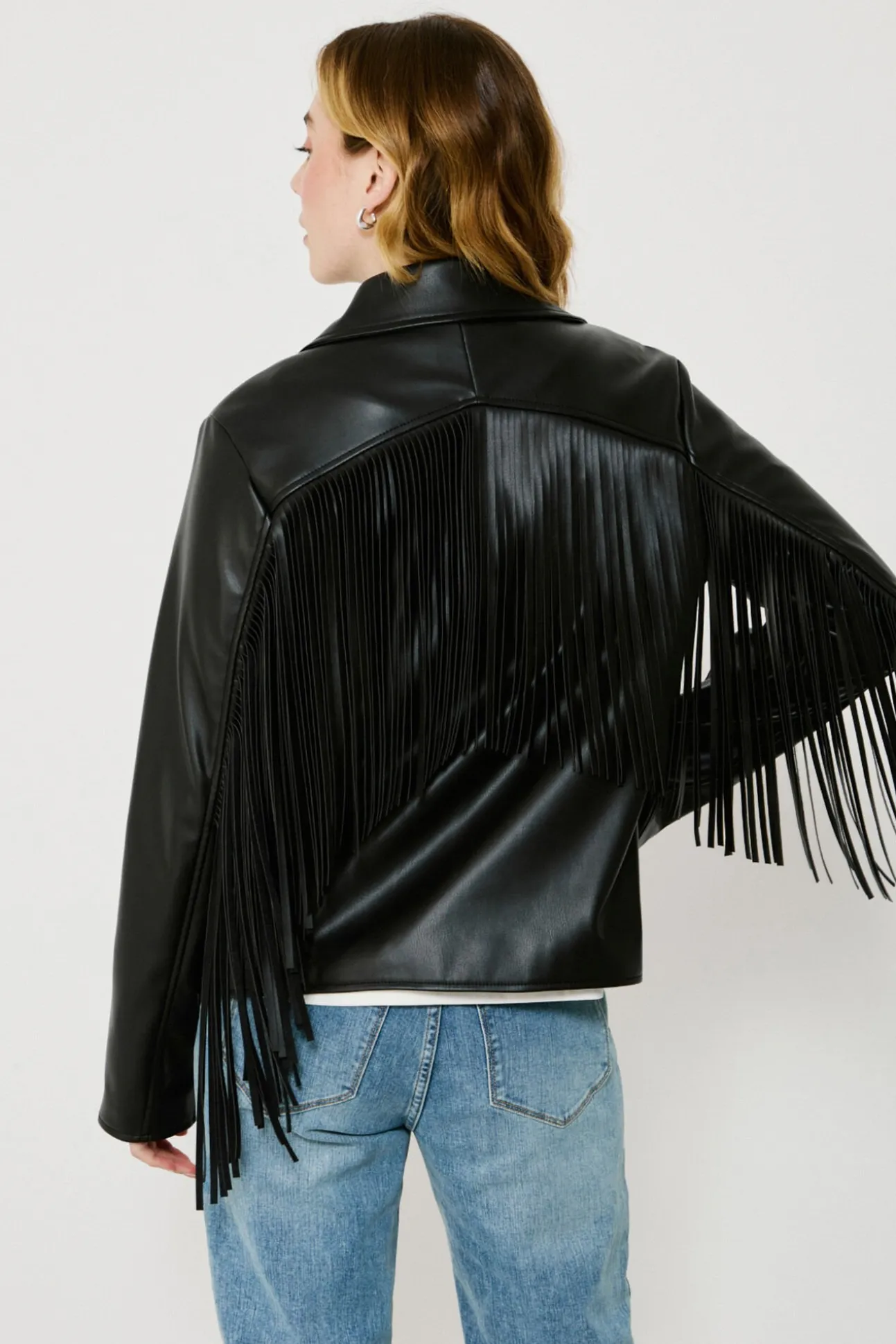 Cazadora biker de polipiel con flecos