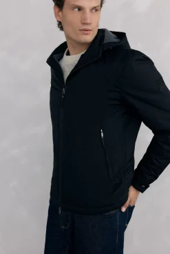 Cazadora cremallera con capucha