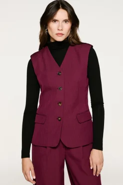 Chaleco traje bolsillos.