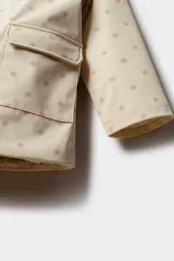 Chaqueta engomada topos niña