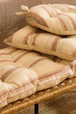 Cojín de silla redondo a rayas en tonos tierra Peru