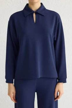 Conjunto top y pantalón con cuello polo Azul