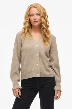 Cárdigan de punto con volantes en puños