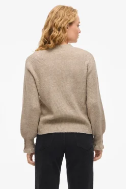 Cárdigan de punto con volantes en puños