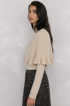 Doble prenda jersey y capa con detalle volante