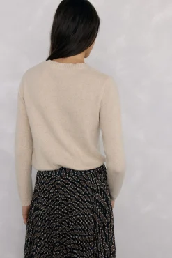 Doble prenda jersey y capa con detalle volante