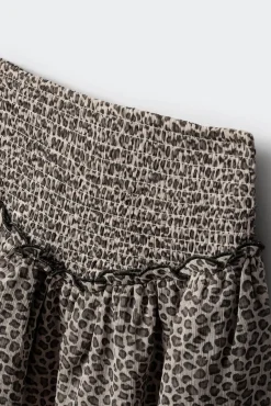 Falda corta con volantes niña