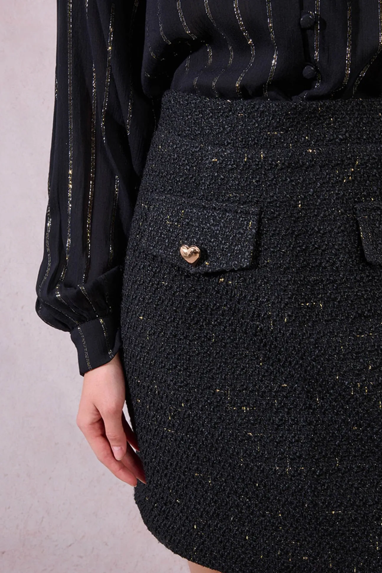 Falda corta detalle corazones