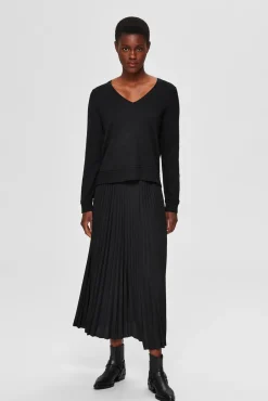 Falda midi plisada con cintura elástica