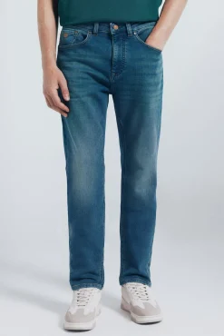 Jeans en knit denim sobretintado slim fit