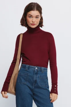 Jersey cuello alto botones puños