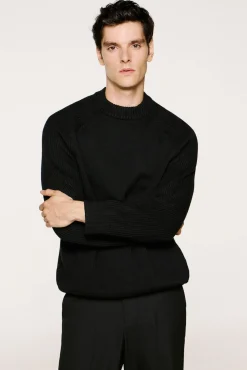 Jersey cuello mock 100% algodón orgánico.