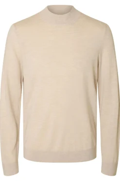 Jersey cuello mock 100% lana merino.