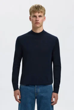 Jersey cuello mock 100% lana merino.