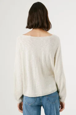 Jersey de punto de manga larga con detalle en las mangas.