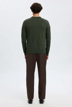 Jersey polo media cremallera 100% algodón.