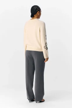 Jersey punto bordado flor