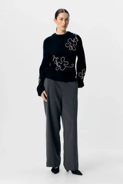 Jersey punto bordado flor