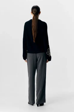 Jersey punto bordado flor