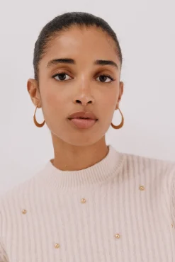 Jersey tachas doradas