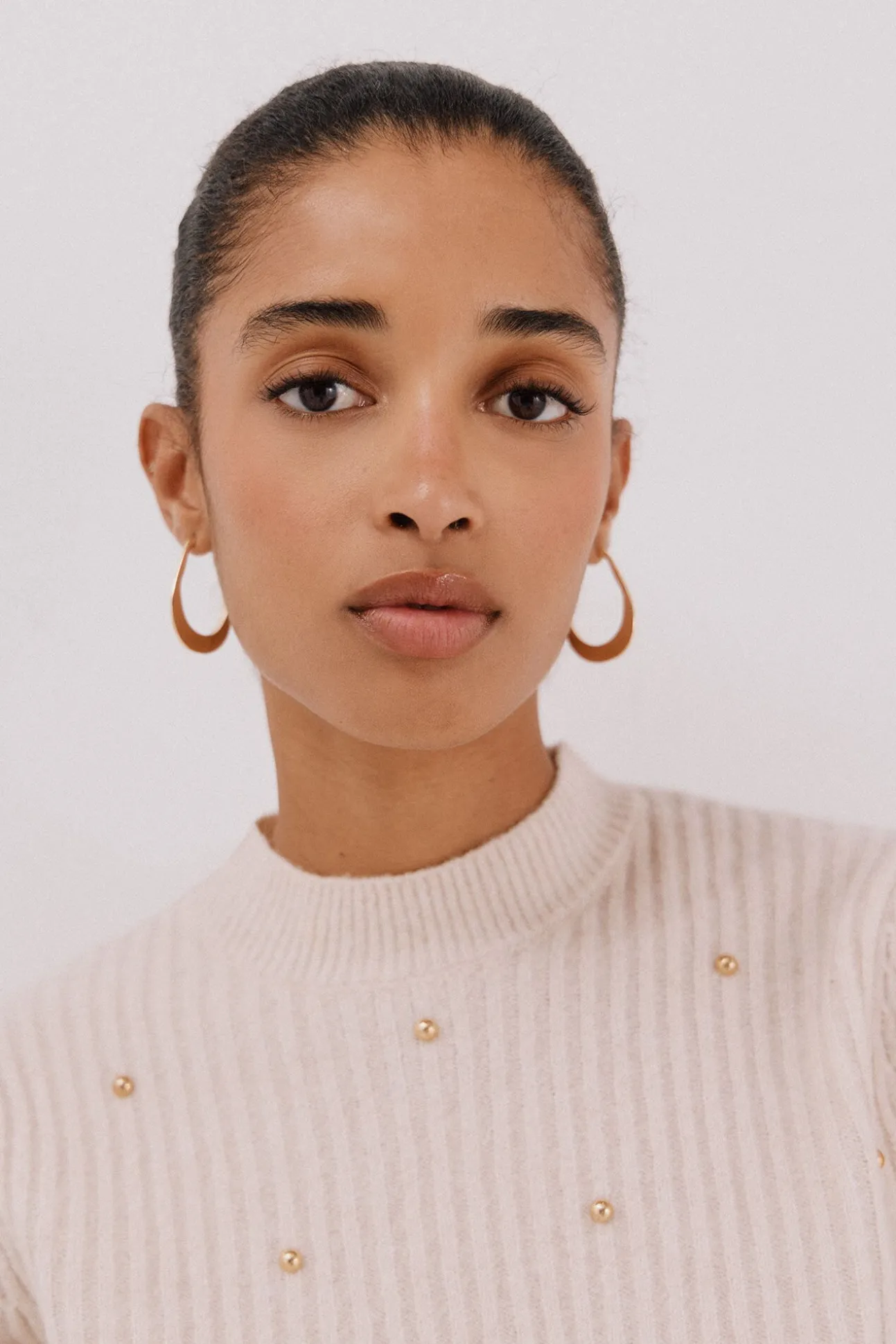 Jersey tachas doradas